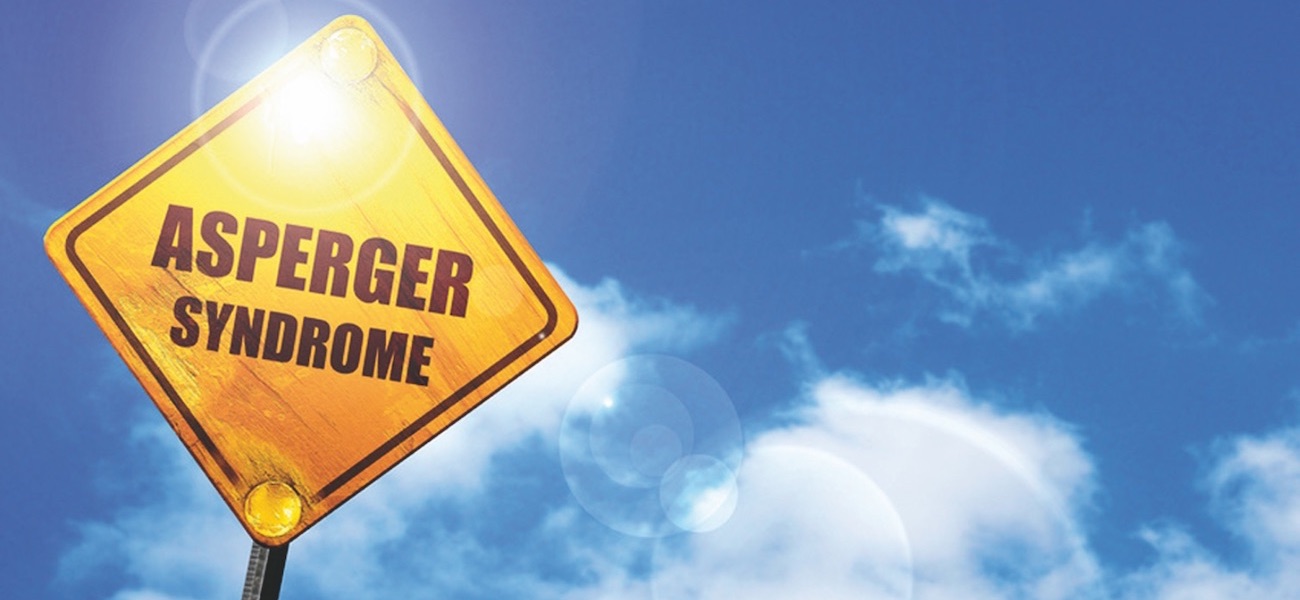 Yellow road sign with a blue sky and white clouds: Asperger synd